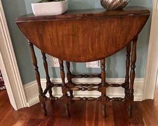 Sweet gate leg table - I love these because 99% of the time it serves as a perfect console table... but when you need an extra table, or friends come over to play cards or need an extra table for holiday entertaining - you have the perfect piece!  