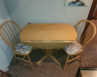 NOW $30, dual drop leaf table with two chairs
