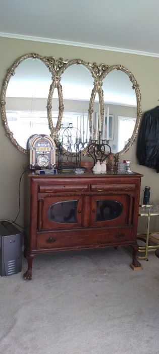 Antique Sideboard with claw feet and decorative mirror