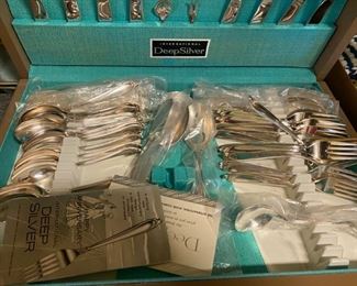 Set of silverware in chest