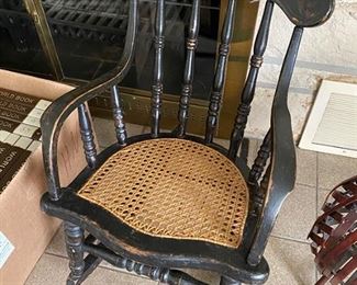 Beautiful cane seat child's rocking chair