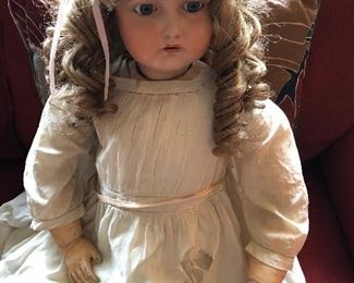 Large Victorian doll with professional restoration