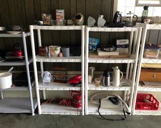 Many white plastic shelves in basement and garage $10 ea.
