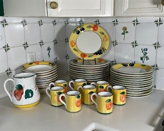 DANSK ITALIAN DISHWARE SET | Including 9 pasta bowls, 12 luncheon plates, 12 dinner plates (dia. 12 in.), 8 mugs, and a pitcher [some pieces with fleabites/chips] 
