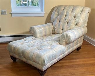 UPHOLSTERED CHAISE LOUNGE CHAIR | Extra long lounge armchair- spacious and comfortable! Having carved pineapple or acorn form feet [upholstery with stains]; h. 39 x w. 40 x d. 60 in. 