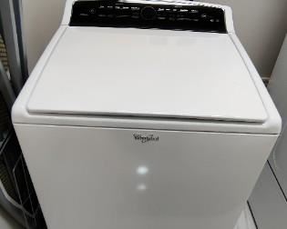 Whirlpool Cabrio Washer 2 yrs old and Samsung Electric Dry 9yrs old with drawer base