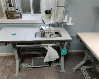 The Juki MO-6814S is Juki’s most popular four-thread Serger. It can be used not only as a four-thread Serger but also a wide three-thread or narrow three-thread Serger. This machine is the most popular Serger out there. The 6814S  is widely applicable to the sewing of light-to-medium weight materials. Since the machine is provided with a needle thread take-up mechanism and a looper thread take-up lever, high-quality, well-tensed soft seams are made with a beautiful texture which flexibly correspond to the elasticity of the materials even when run at speeds as high as 7,000 stitches per minute. In addition, the machine has a wider and brighter needle entry and provides improved responsiveness to the materials, thereby helping you use the machine more easily. The optimally-balanced design of the machine reduces both operating noise and vibration, contributing to more comfortable sewing work. Includes commercial table, pedal and upgraded Servo Motor. Sells new at Missouri Sewing Machine C