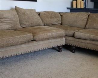 #36,  $400.00.   Down filled over sized sectional sofa section one 35” X 107” X 48” Section two 86” long combined longest point 133” 