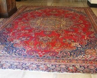 #49.   $500.00  Ghom Rug,  Qom Province of Iran.   rough edges small stain on edge 134” X 95”  (11x8 appx)
