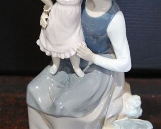 #63.  $50.00   Nau by LLadro figure w/ box mother with child 