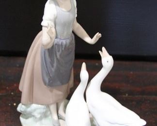 #64.  $40.00  Nau by LLadro figure w/ box girl with geese 
