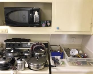Microwave, pots, pans, And utensils