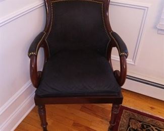 Adorned cherry wood chair with nail head detail