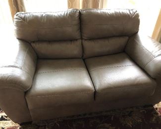 Leather loveseat. Part of three-piece set. $400