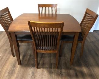 Small dining table and four chairs. $250