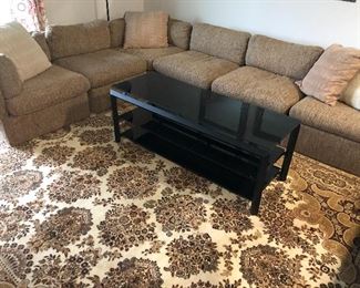 Thayer Goggin  sectional $500. Black coffee table $100. Area rug $150 (sold).