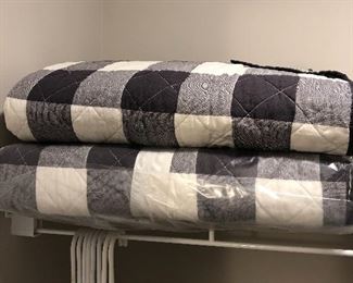Two twin bed covers. Gray and cream buffalo check. Matching pair to two on twin beds (4 total) $60 pr. 
