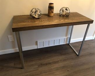 Sofa table 46” wide x 18” deep x 30” tall $70 (sold). Metal pumpkin candle holders $8 pr. Signed pottery vase $15.
