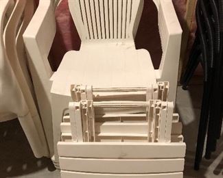 Set of 4 plastic chairs and two ottomans $45