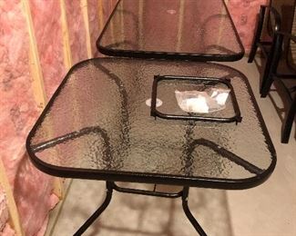 Glass outdoor tables. 31.5” square $45. 55” x  31.5” rectangle $50.