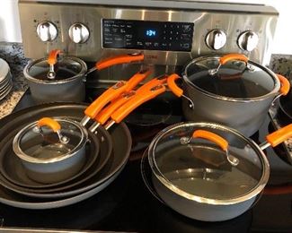 Rachel Ray 8 pan set with lids in very good condition. $75