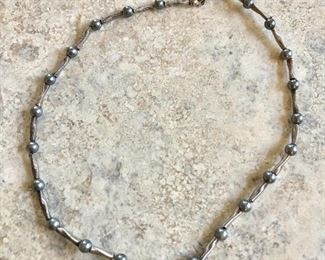 $12 Faux pearl and silver tone necklace.  18"L 