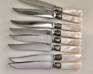 $75 8 small  cheese/fruit  knives with sterling and mother of pearl handles.  Each 6.25" L. 