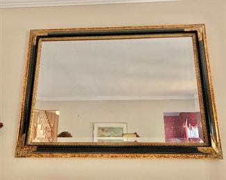 $275  - Black and gilded mirror - 29.5" H x 42" W. 