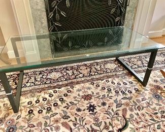 $140 Glass and black metal coffee table.  15.75" H, 47.25" L, 23.5" W.