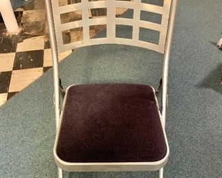 $60 Set of 4 folding chairs. Each 36.25" H, 18.5" W, 16.5" D, seat height 19.5". 