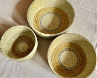 $60 -  Set of 3 nesting stoneware bowls, signed.  Large: 3" H, 8.25" diam.  Medium: 3.5" H, 7 " diam.  Small: 3.5" H, 5.5" diam. 