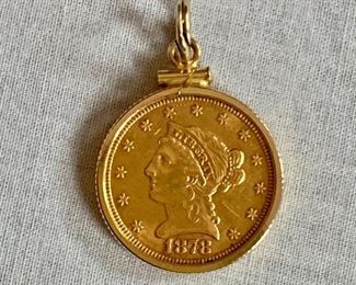 $450 22K Gold coin with 14K border.  1"L, 0.8diam 