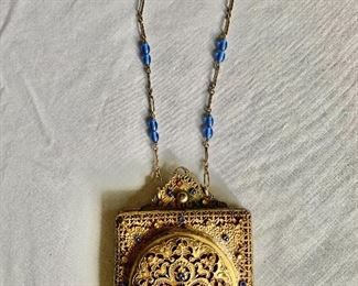 $350 Antique  filigree with stones metal purse on chain.  4.25" H, 3" W, handle drop 7.25".  