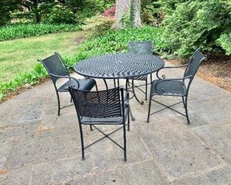 $395 - Iron patio set - Table 29.5" H, 48" diam.  4 chairs each 34" H, 19.5" W, 17" D, seat height 18". 