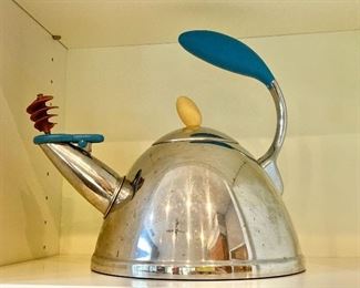 $40 - Michael Graves tea kettle.  10.5" H, 11" W, pot 8.75" diam.