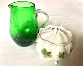 $12 each .  Green glass pitcher and green and white sugar  bowl.  Pitcher: 4.25" H, 3.5" W.   Covered bowl: 3" H, 2.75" diam.