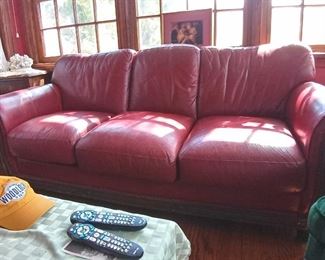Red leather couch (alternate view)