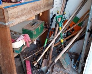 Shovels / brooms / assorted garage essentials