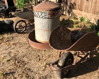 Unusually large poultry feeder.  Just imagine what a great planter or even a water fountain you could make!