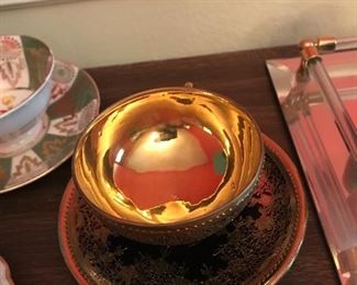 Bohemian gold overlay cup and saucer 
