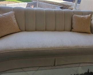 1002	

2 Cream Upholstered Couches
Measures approx 96" x 36" x 36"