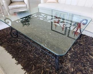 1004	

Glass Top Coffee Table with Metal Base
Measures approx 47" x 59"
Rug not included
