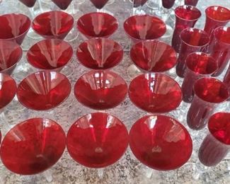 1022	

16 Red Glass Martini Glasses and 10 Red Glass Campagne Glasses
16 Red Glass Martini Glasses and 10 Red Glass Campagne Glasses
