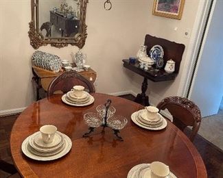 Wood inlay dining table with 2 additional leaves and custom table pads
48 piece Charleston pattern China by Lenox