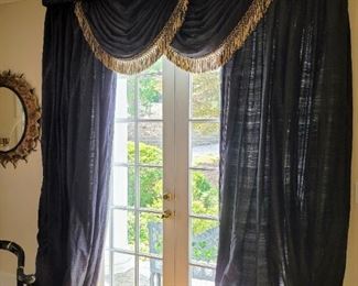 Custom made drapes and cornice board. With a tiny bit of creativity and vision, the custom drapes in this house can be altered slightly to work in almost any stylish home.