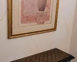 Console table and artwork. 