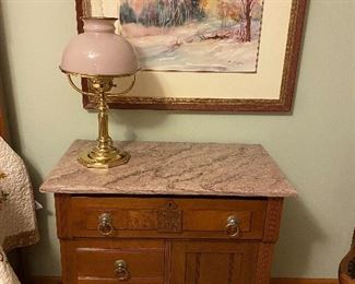 Marble top antique stand, vintage table lamp, framed art