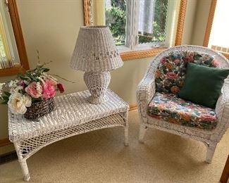 Wicker chair (2 of 2), table, lamp, floral basket
