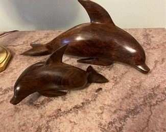 Wood carved whales
