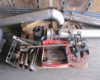 Various Truck Parts featuring exhaust pipes- Hydraulic controls- Exhaust pipes